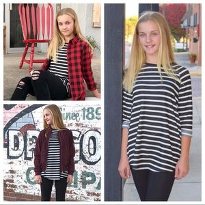 Girls’ black & white stripe top with pockets